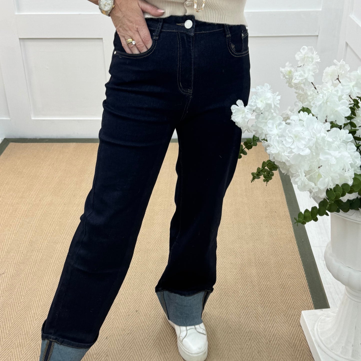 Nykki: Dark blue pocket turn up jeans. Sizes: 10-20