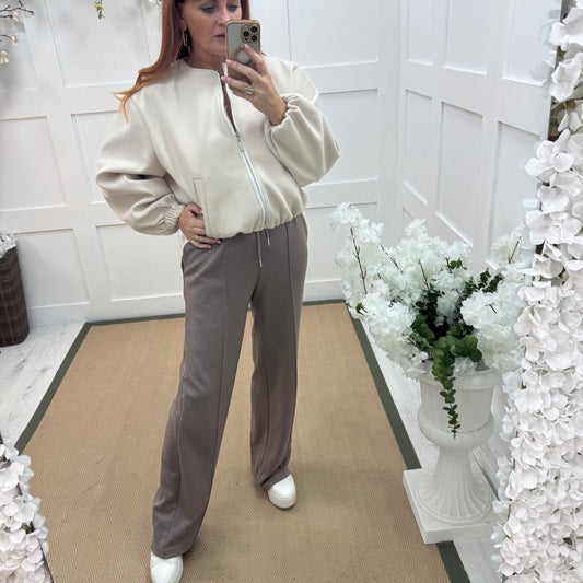 Trudy: Taupe stretchy wide leg pocket trousers. 2 sizes
