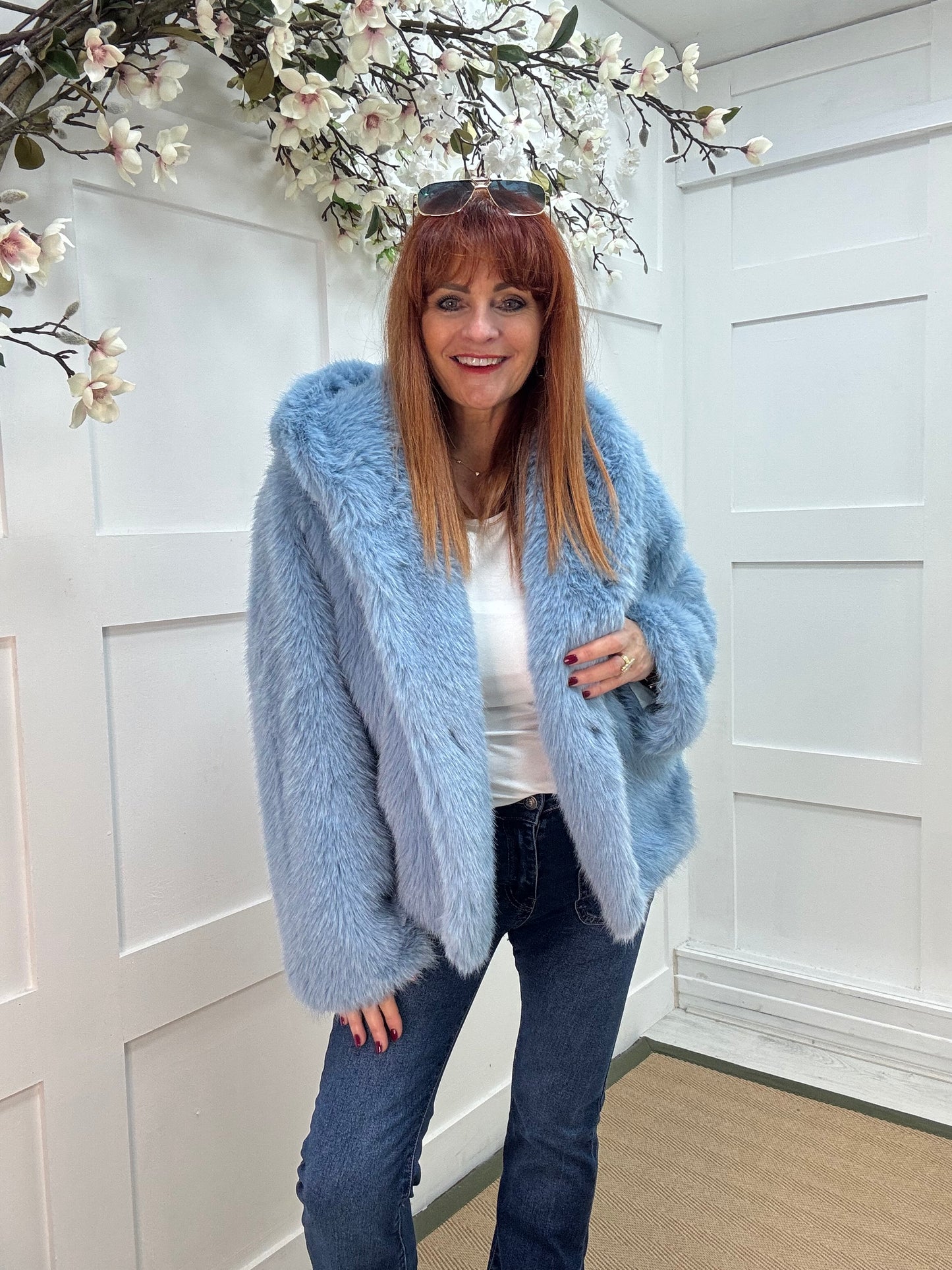 Foxy: Blue short faux fur hooded jacket. One size 12-16