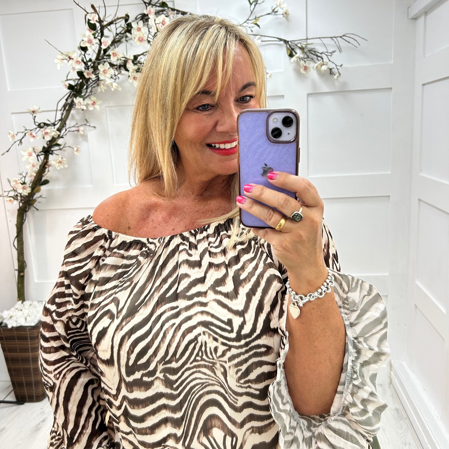 Foxy: Brown zebra double frill chiffon top. One size: 10-20