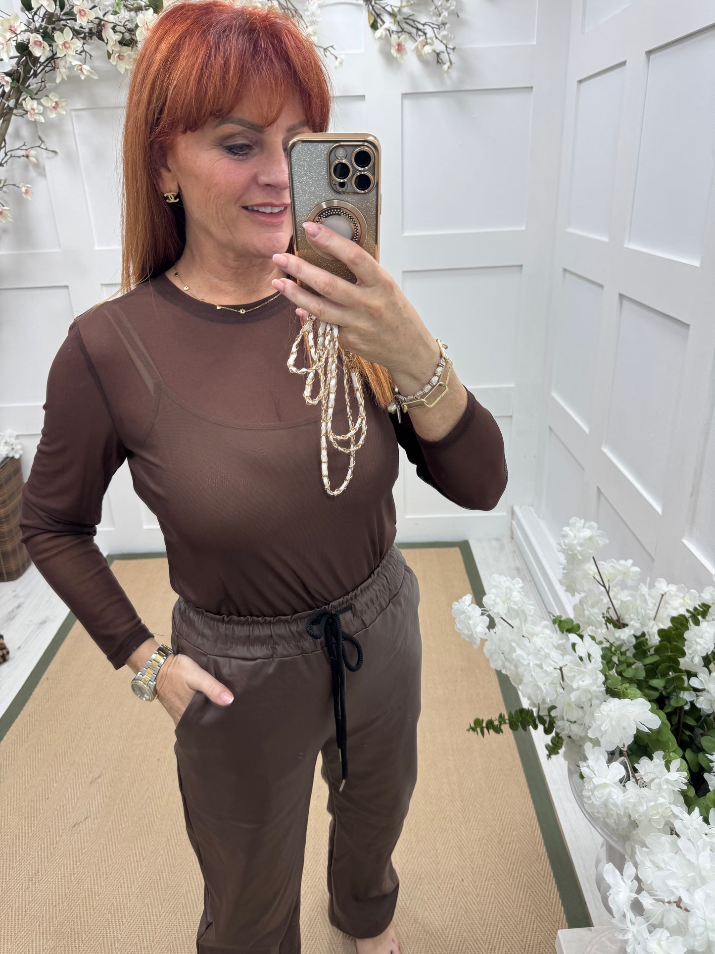Romy: Brown sheer mesh top. One Sz: 12-18
