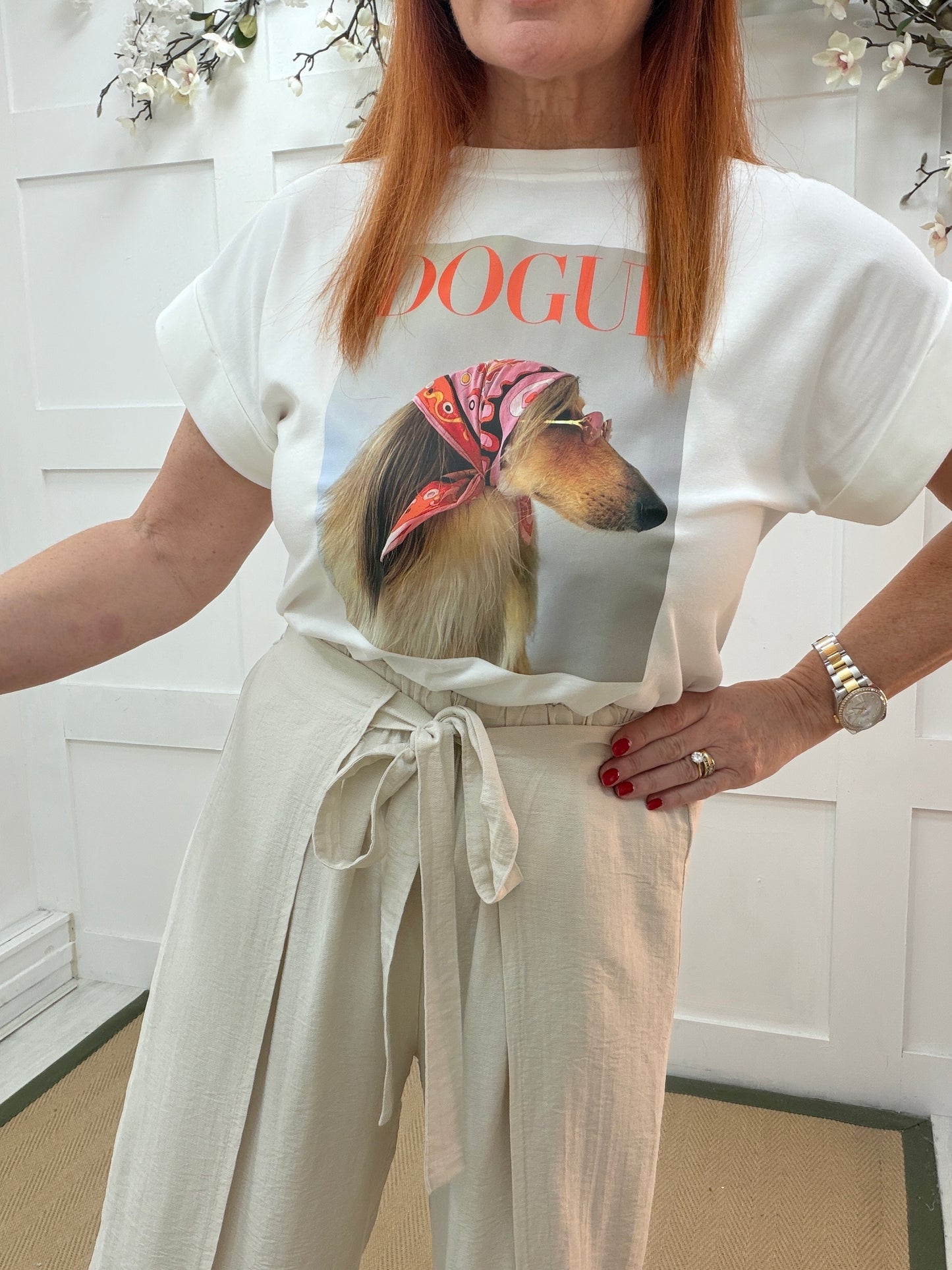 Eden: Cream tie waist wide leg trousers. One size: 10-16