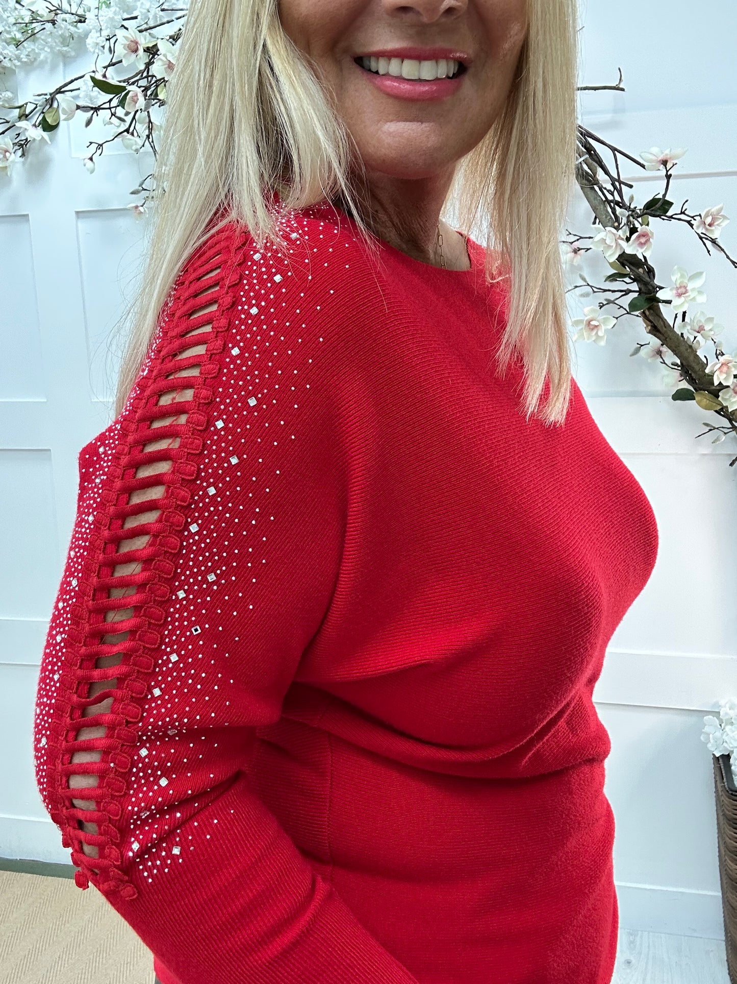 Arianne: Red sparkle cutout shoulder top. One size: 12-16