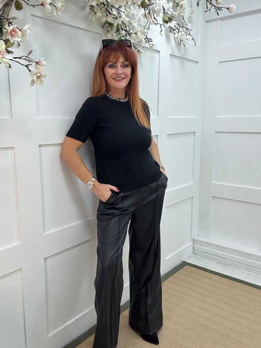 Rosheen: Black rhinestone pocket top. One size: 8-14