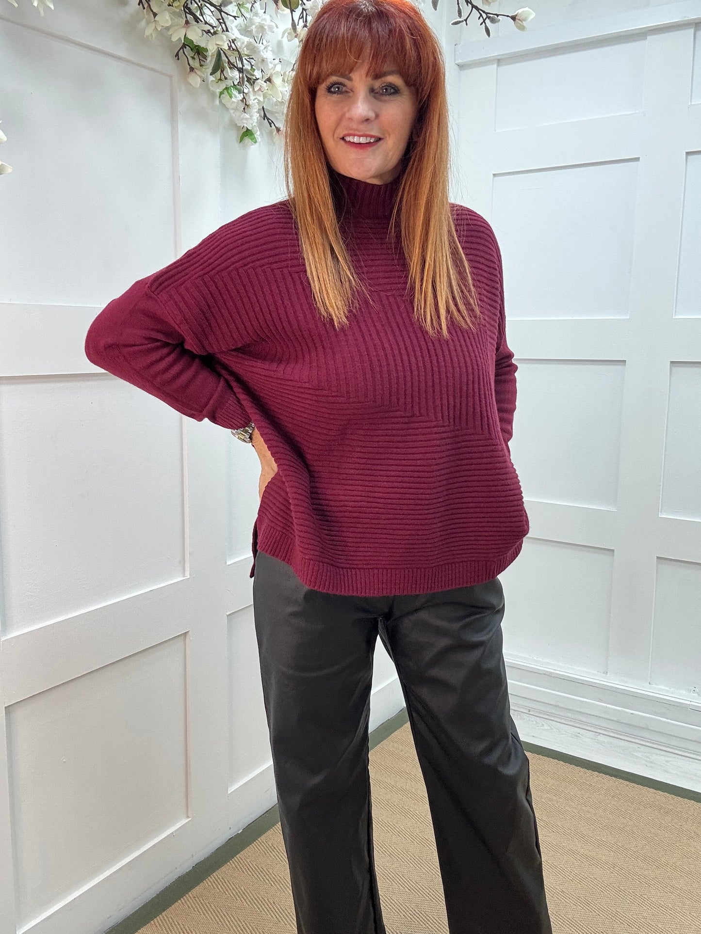 CJ: Burgundy high neck knitted top. One Sz: 12-18