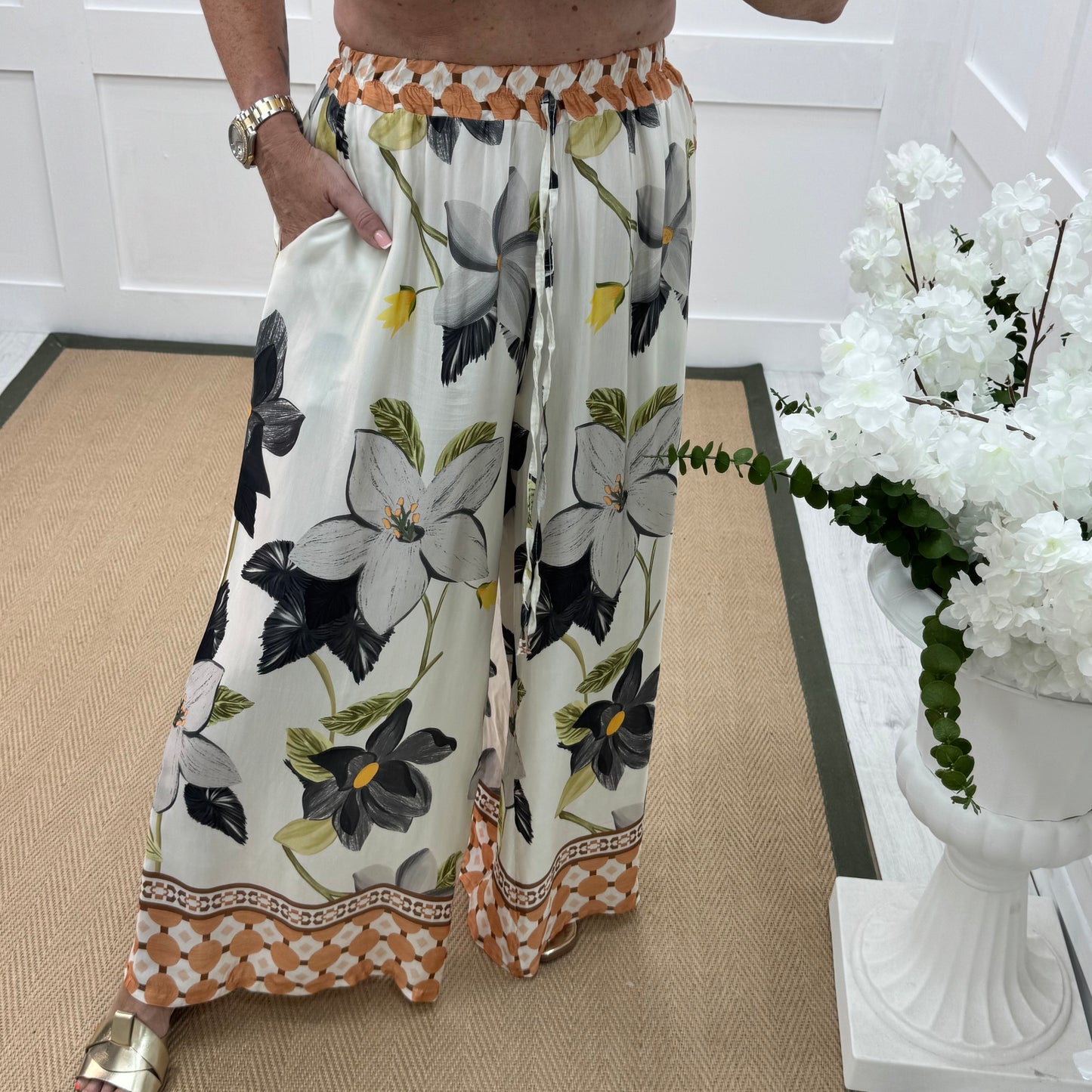 Bianca: Silky floral print wide leg trousers. One size: 10-16/18