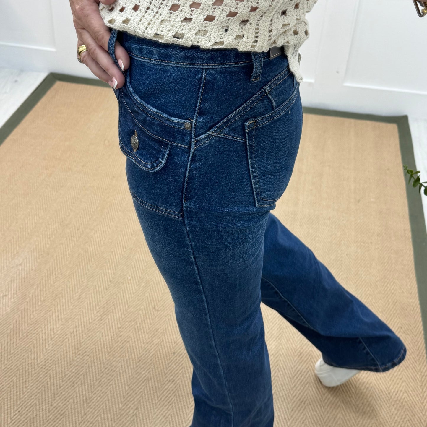 Rey: Dark blue pocket bootcut jeans. Sizes: 8-16