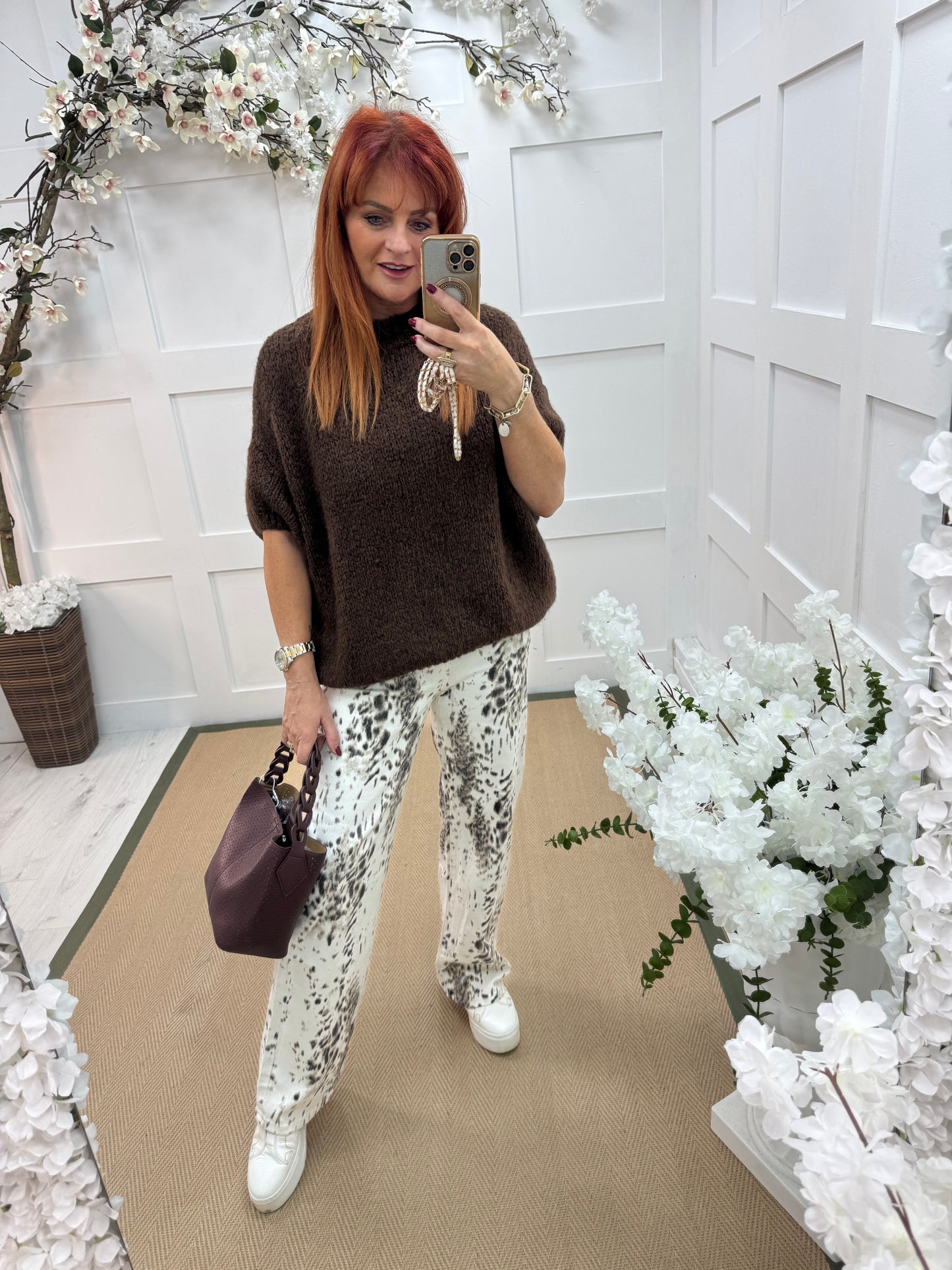 Libby: White & brown patterned jeans. Sizes: 10-20
