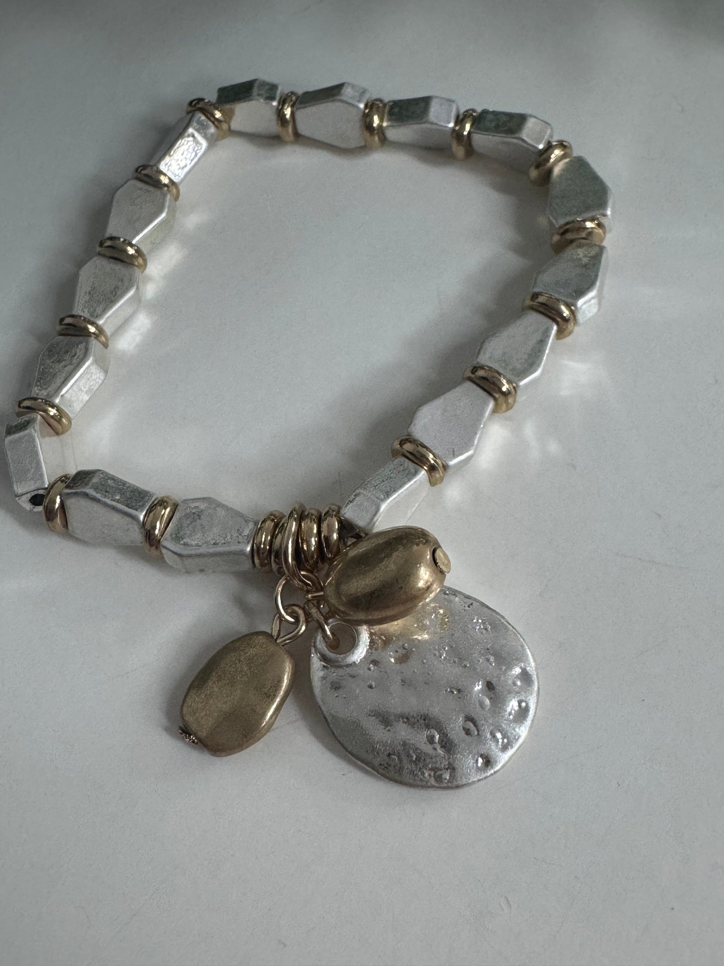 Shana: Silver & gold metal charm bracelet