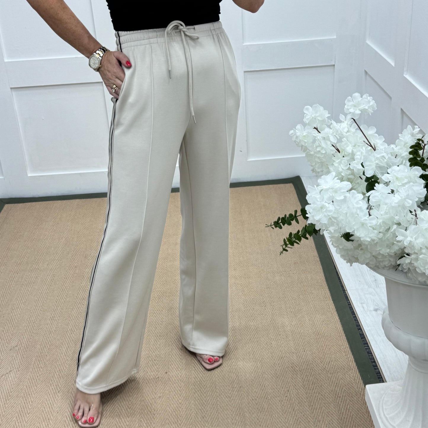 Roxi: Cream stretchy pocket sports trousers. 3 sizes
