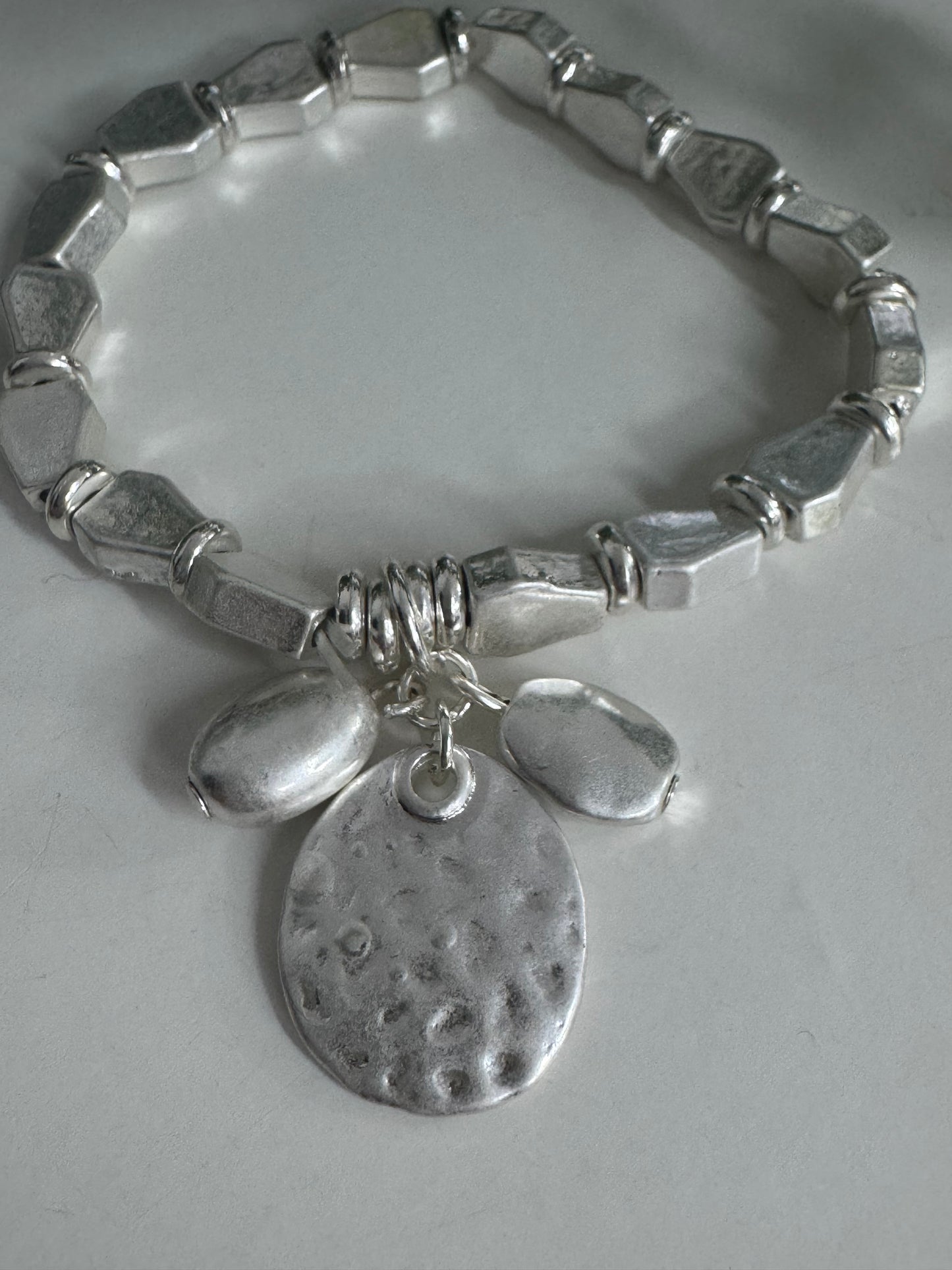 Shana: Silver metal charm bracelet