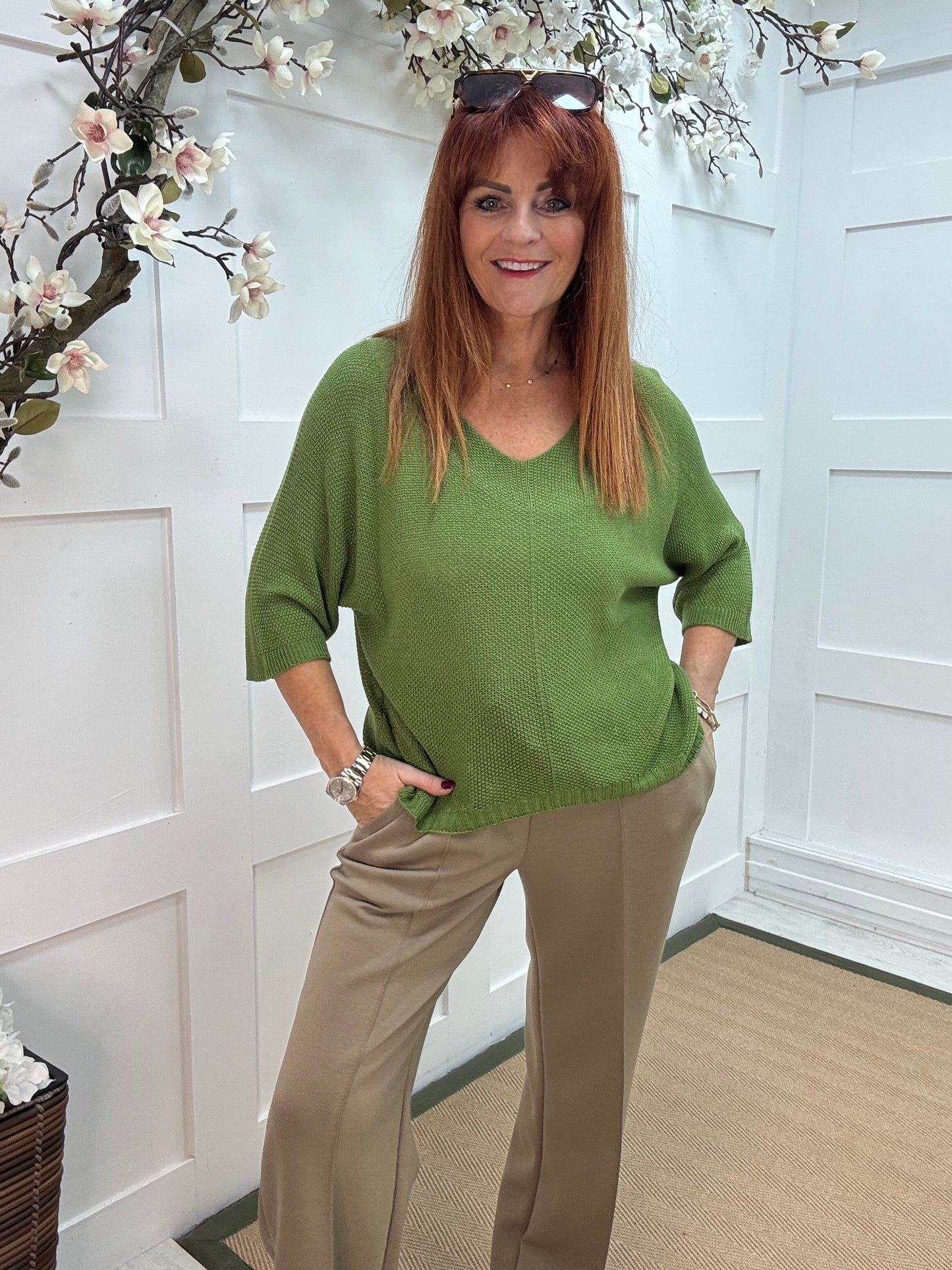 Nina: Green V neck fine knit top. One size: 10-16