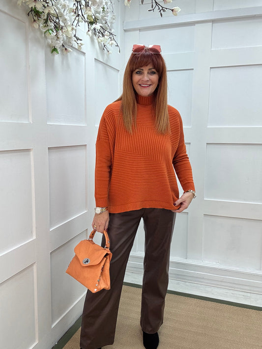 CJ: Orange high neck knitted top. One Sz: 12-18