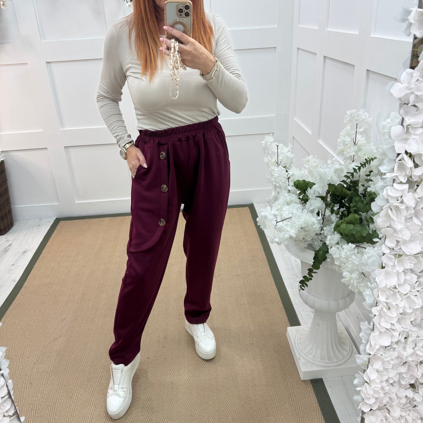 Monroe: Burgundy stretchy button trousers. One size: 12-18