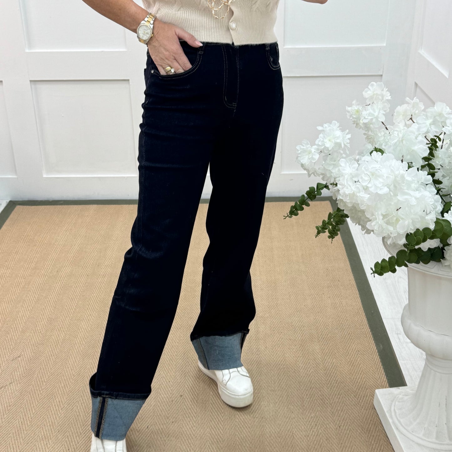 Nykki: Dark blue pocket turn up jeans. Sizes: 10-20