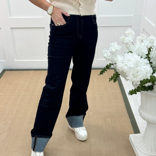 Nykki: Dark blue pocket turn up jeans. Sizes: 10-20