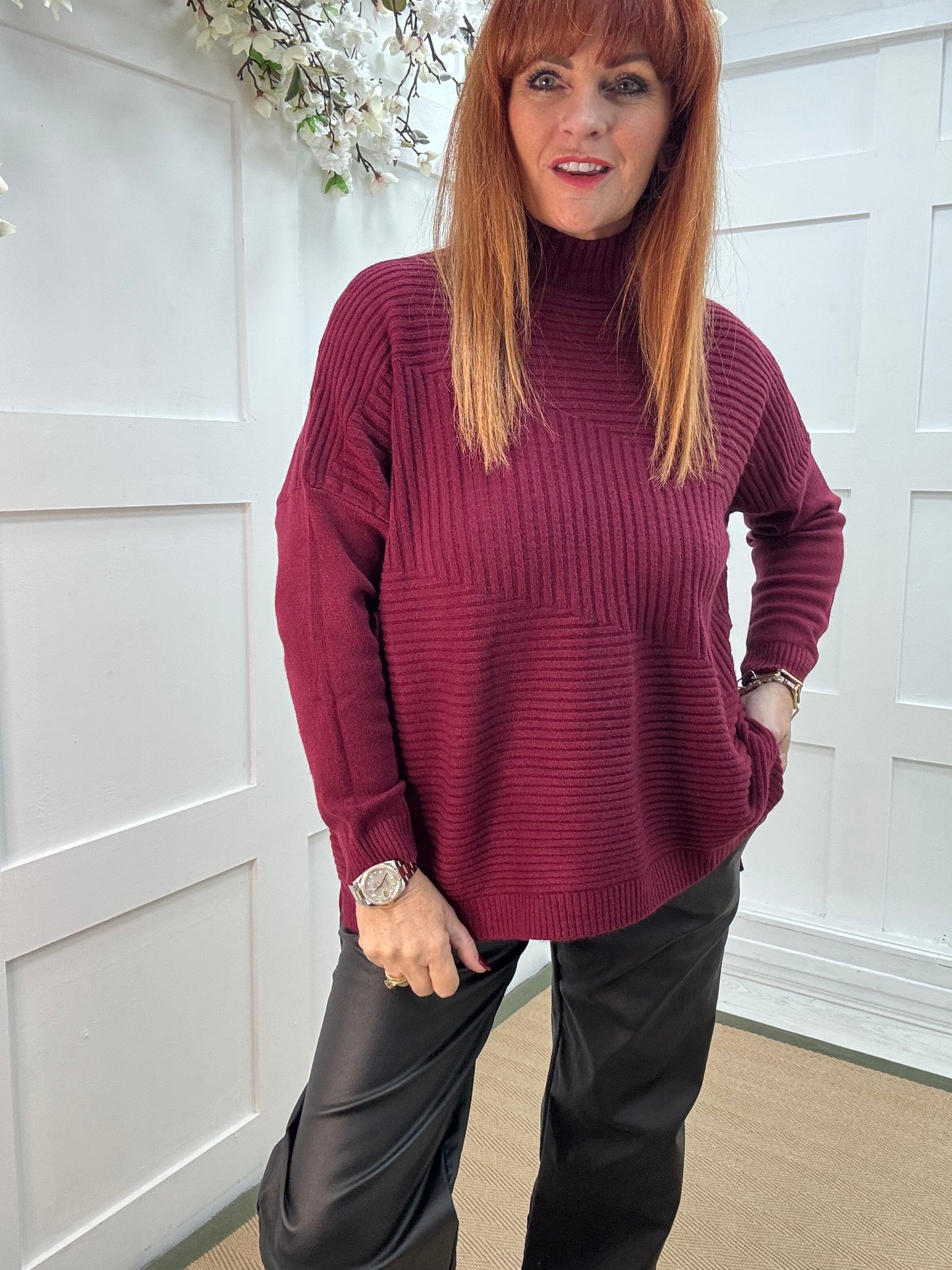CJ: Burgundy high neck knitted top. One Sz: 12-18