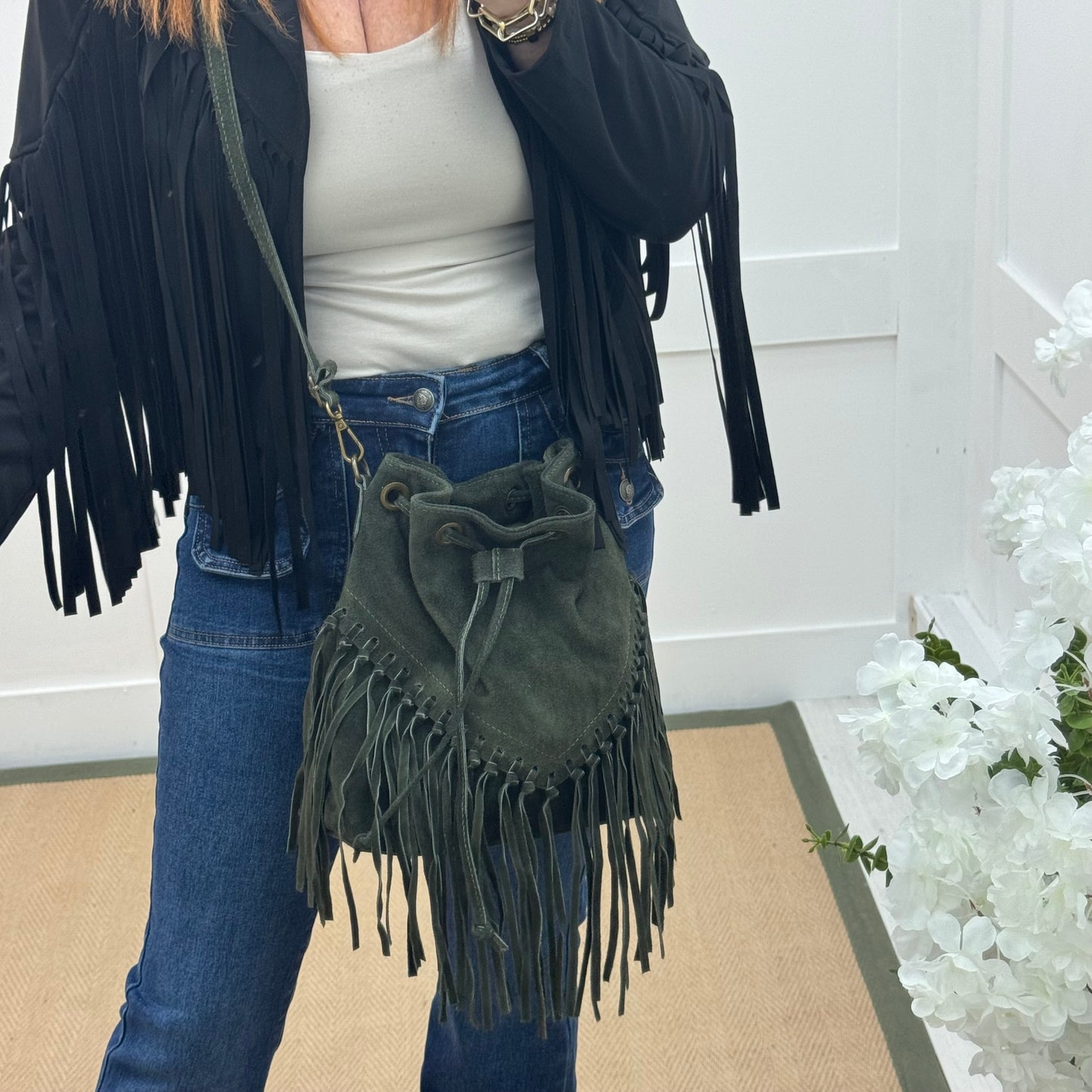 Athena: Green real suede fringe cross body bag.