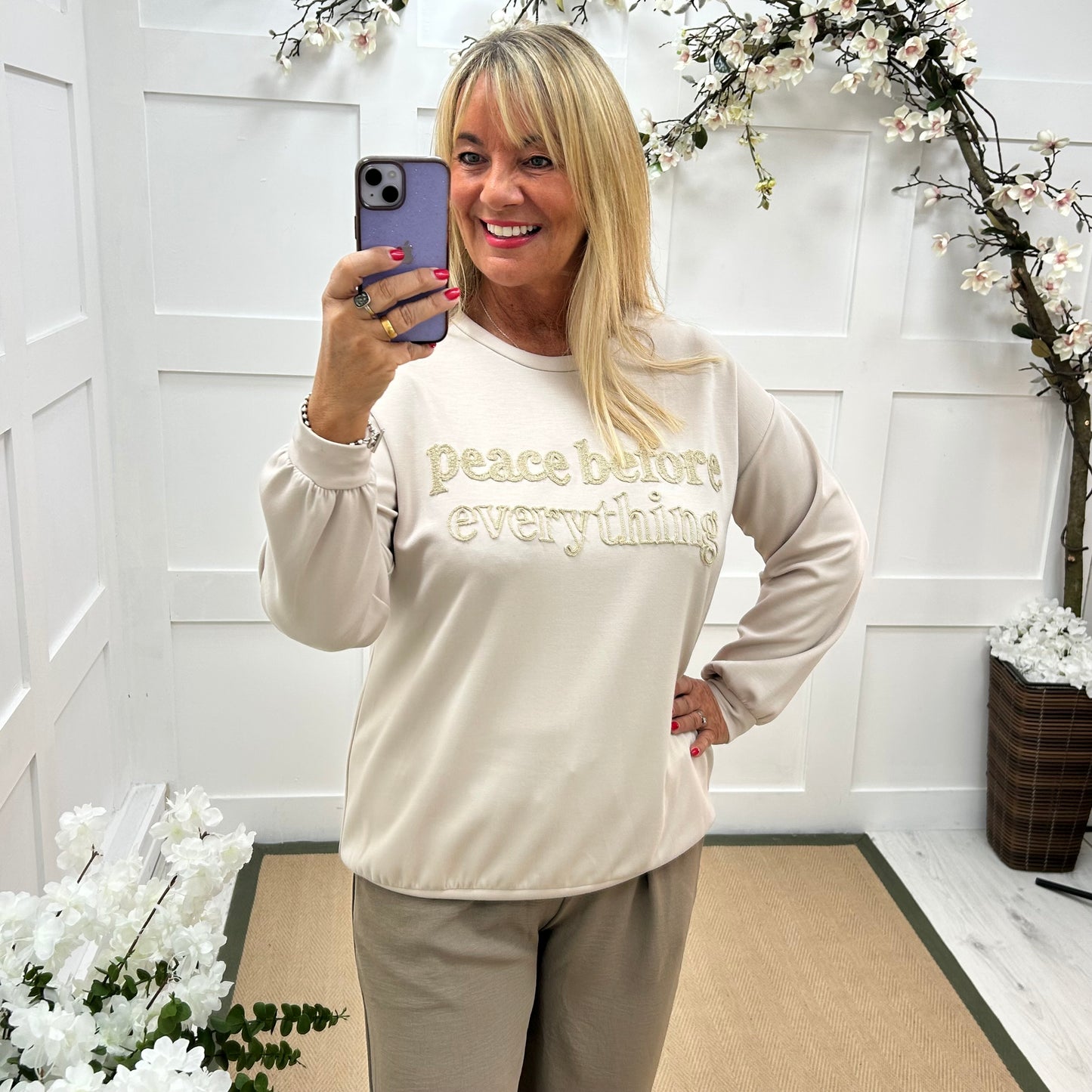 Prya: Cream oversized Peace slogan sweatshirt. One size: 14-20