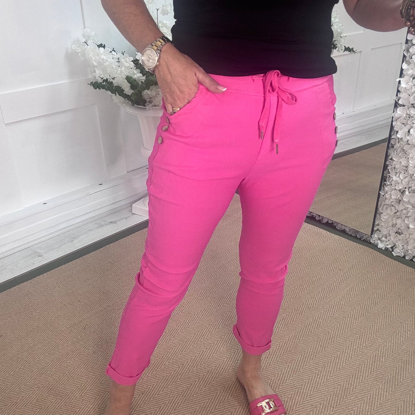 Betsy: Stretchy hot pink button magic trousers. One size: 10-14