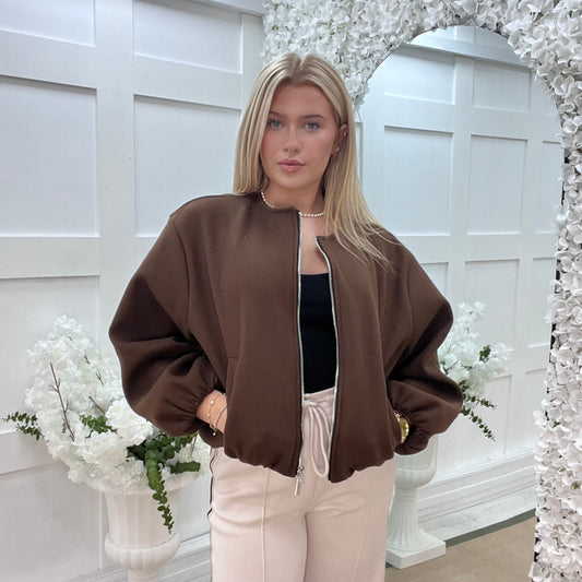 Jamiee: Brown soft feel bomber jacket. One size: 8-16