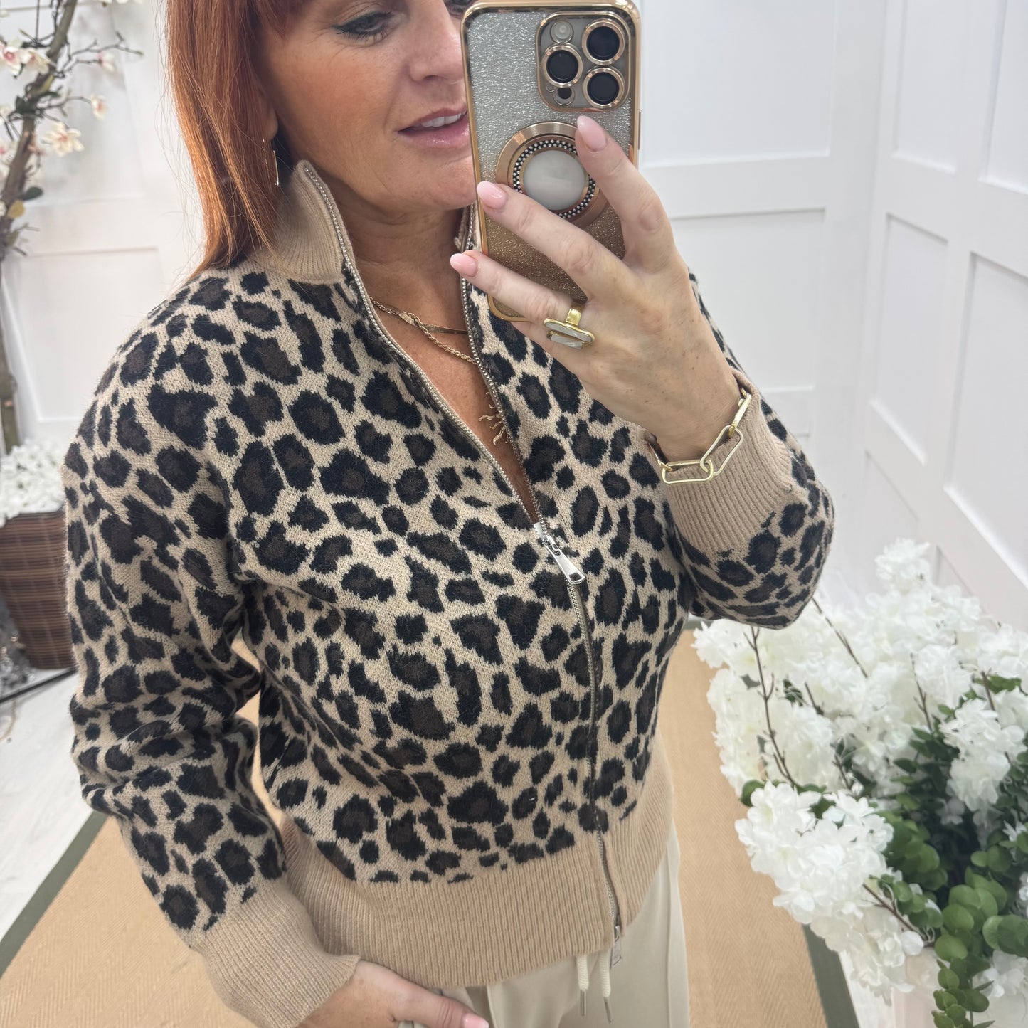 Ursula: Beige leopard print zipped neck top. One size: 12-18