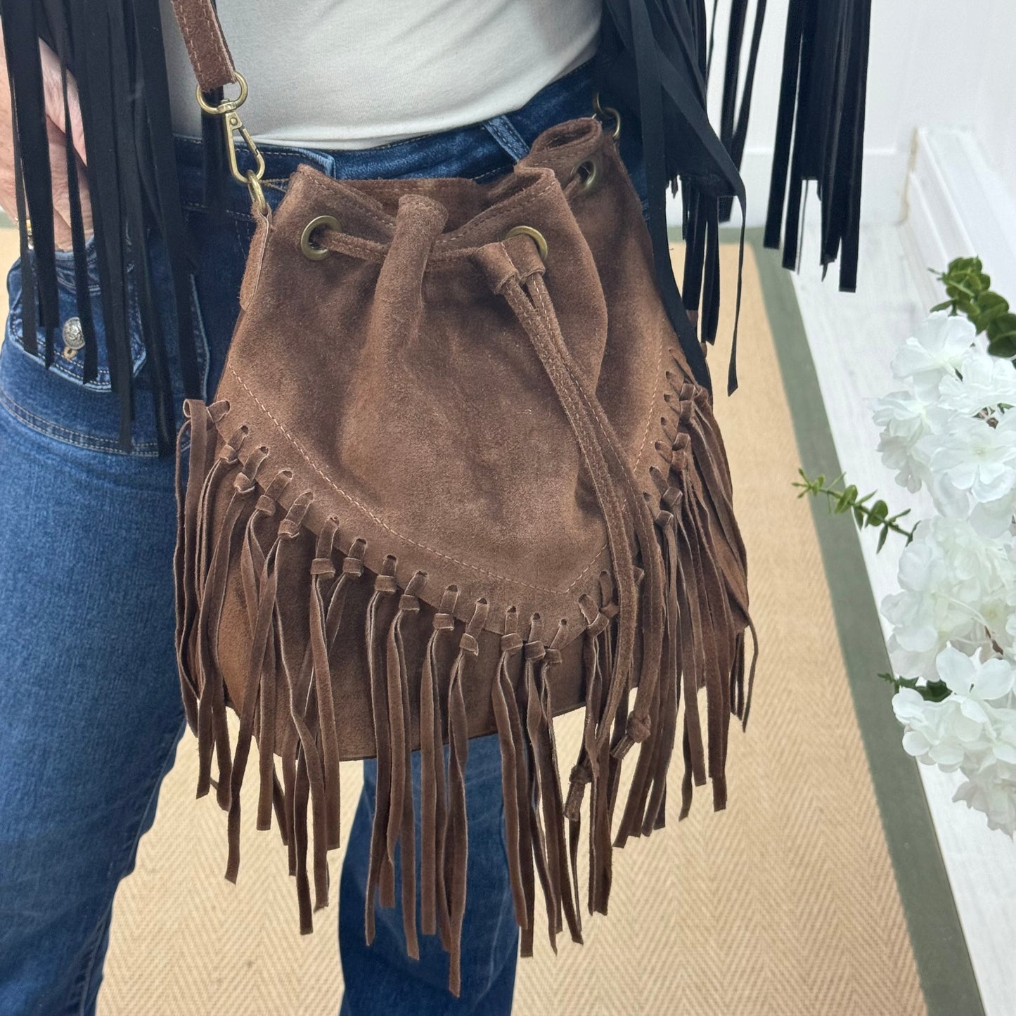 Athena: Brown real suede fringe cross body bag.
