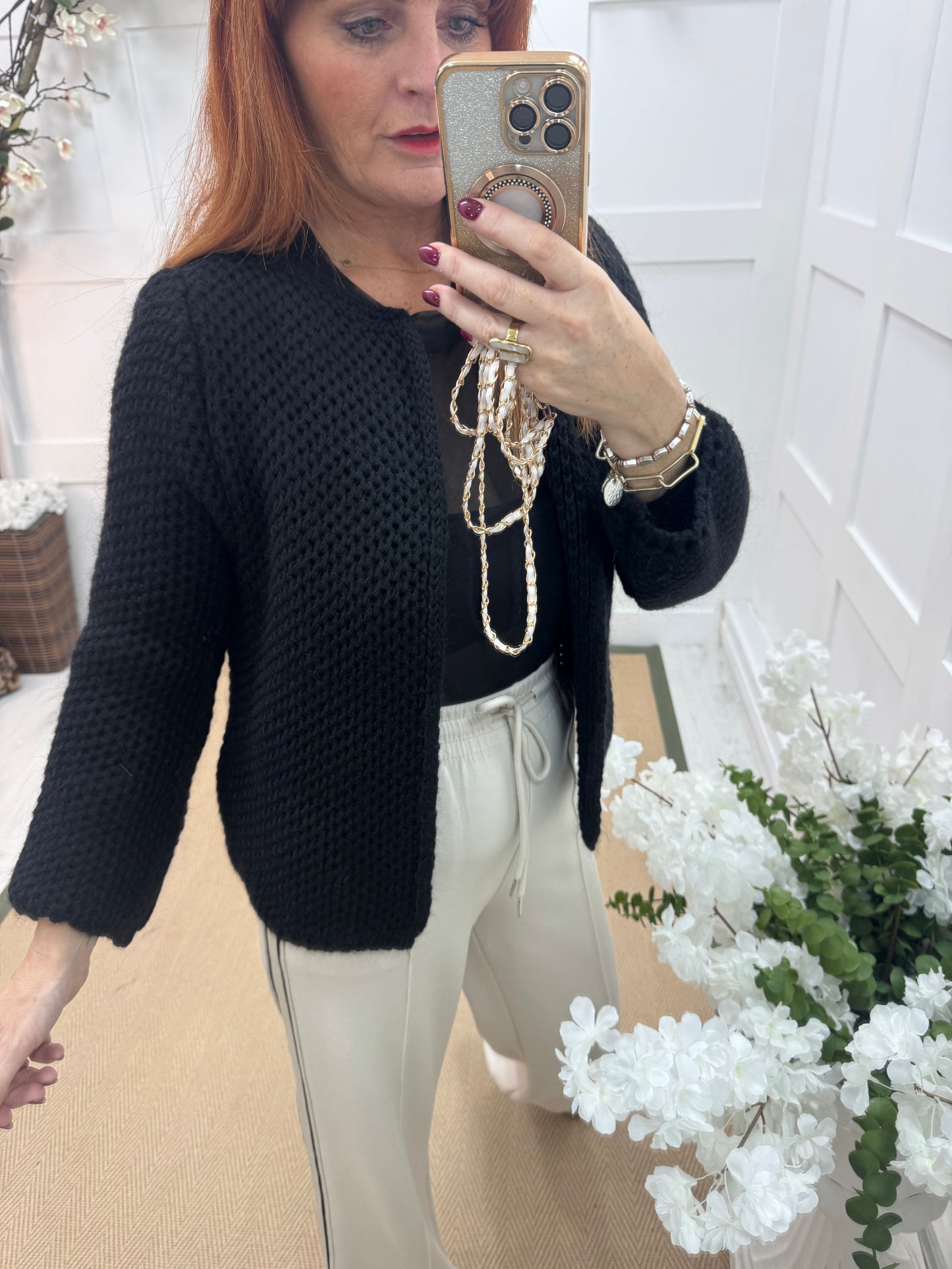 Skye: Black knitted boxcut cardigan. One size: 10-18
