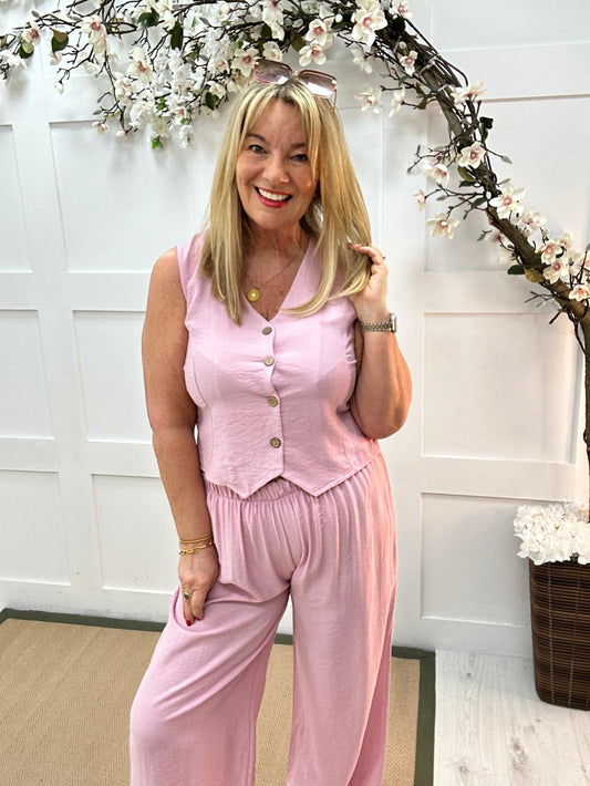Cody: Pink waistcoat two piece trouser set. One size: 12-16