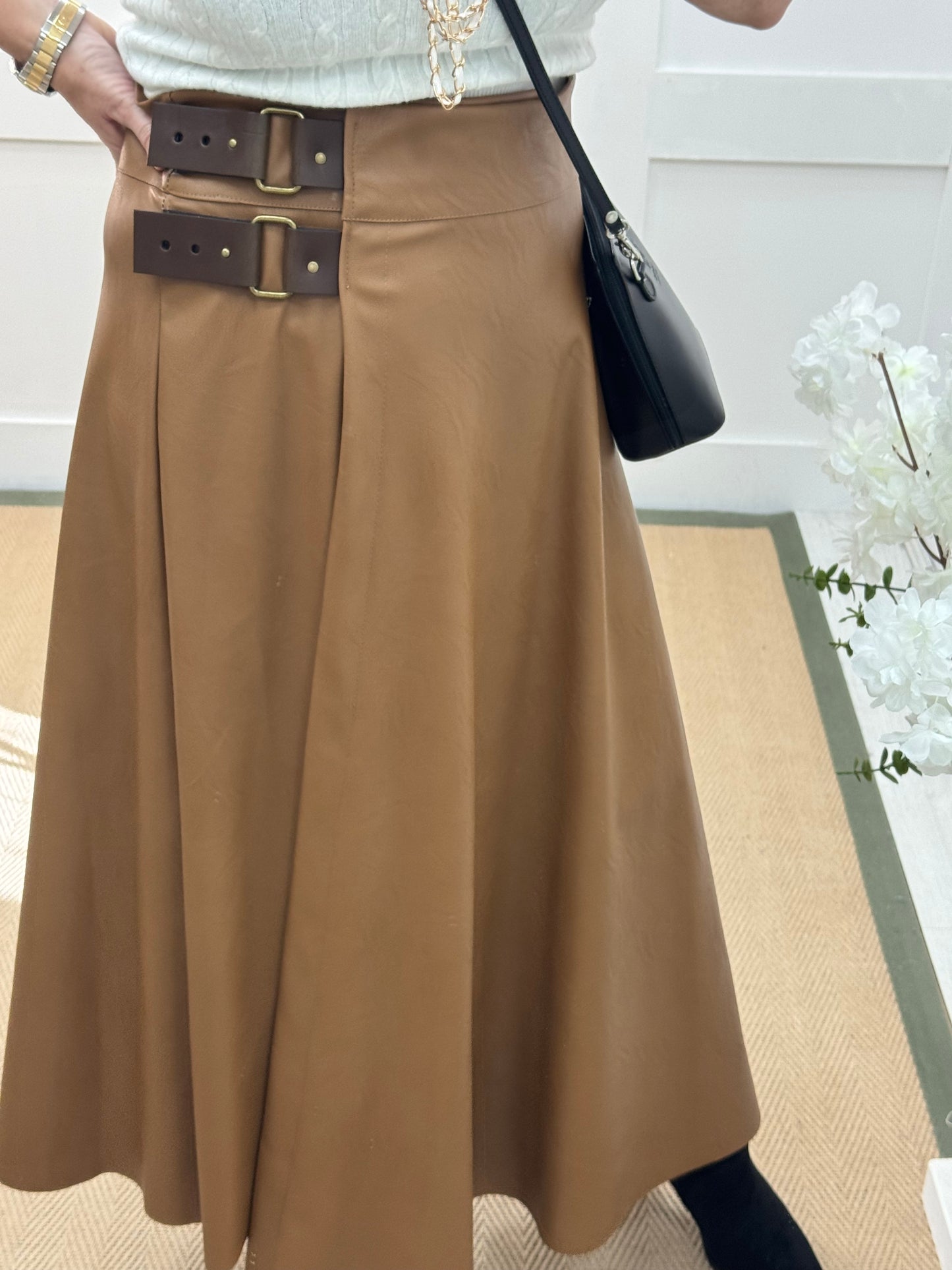 Raine: Tan faux leather belted asymmetric skirt. One size: 12-16