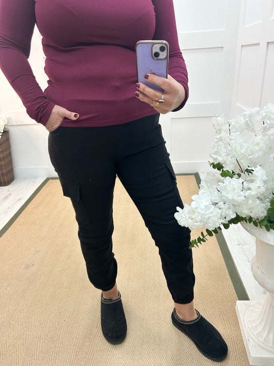 Charley: Black cargo jogger trousers. Two sizes.