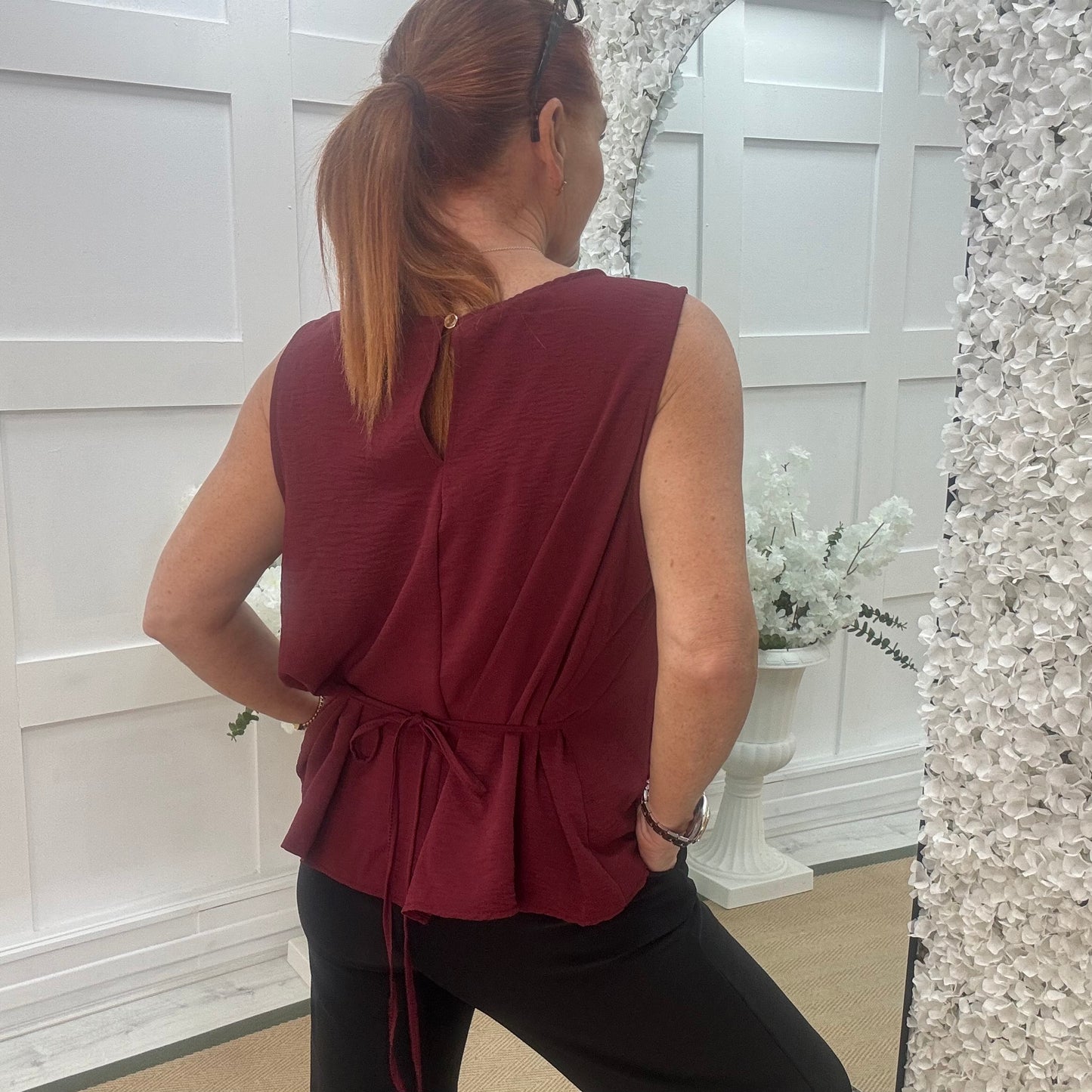Maisie: Burgundy tie waist peplum top. One size: 14-18