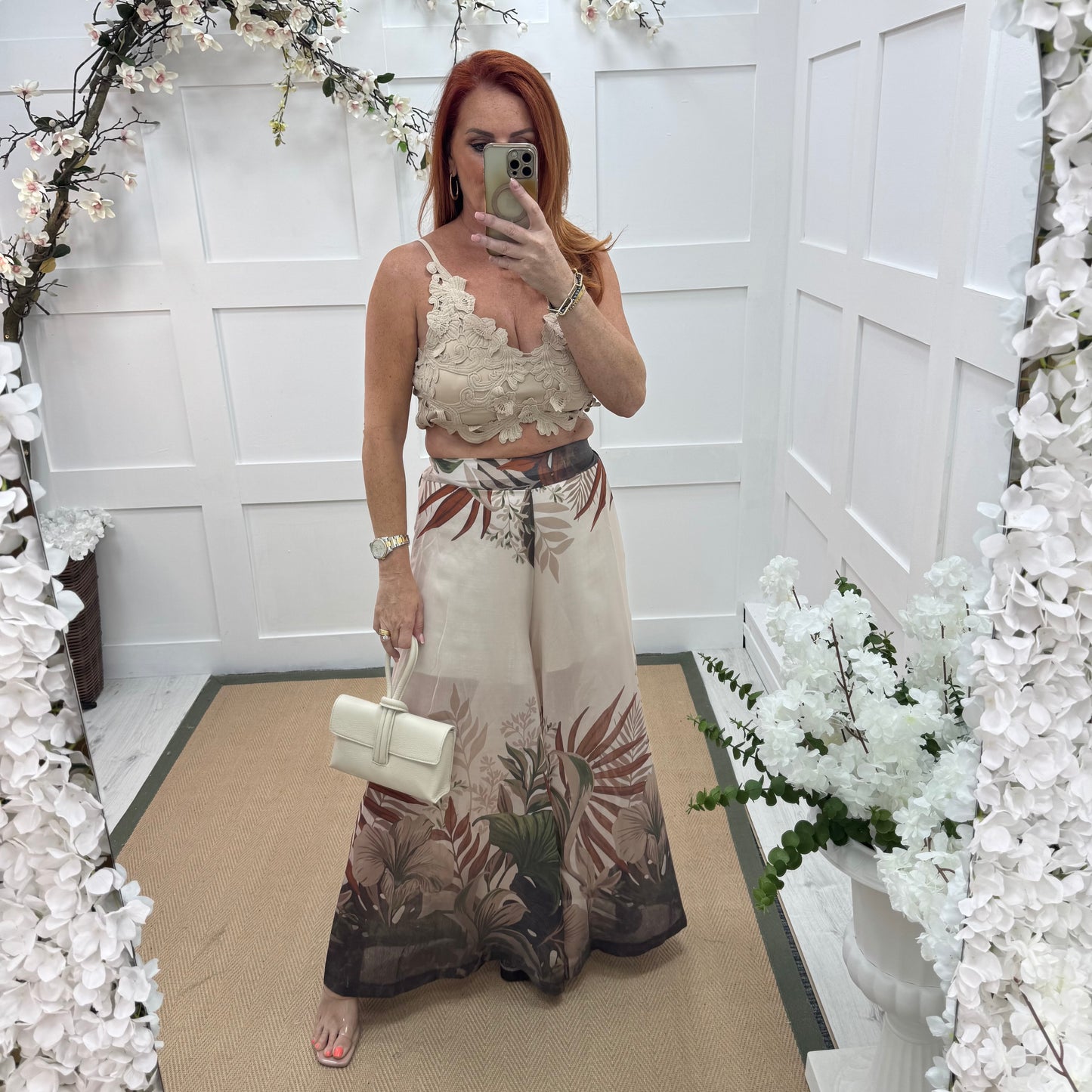 Lyra: Cream tropical print wide leg sheer trousers. One size: 8-14