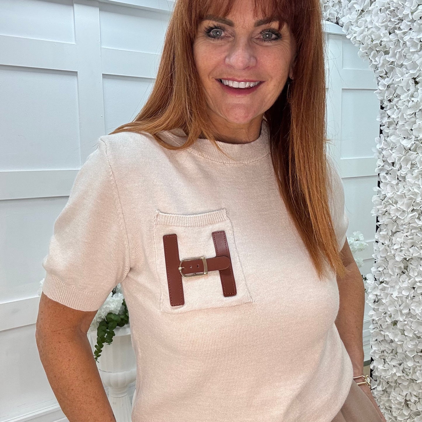 Harley: Cream H logo knit top. One size: 10-16