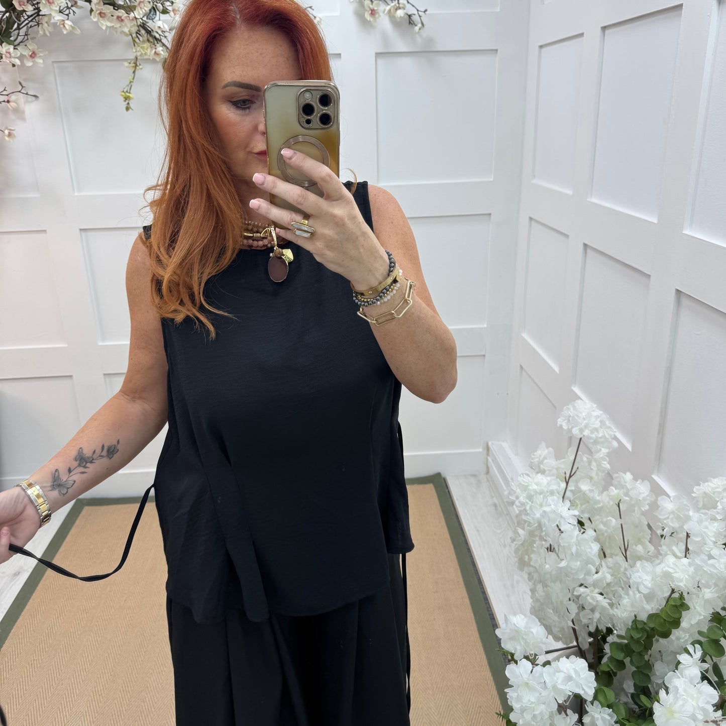 Maisie: Black tie waist peplum top. One size: 14-18