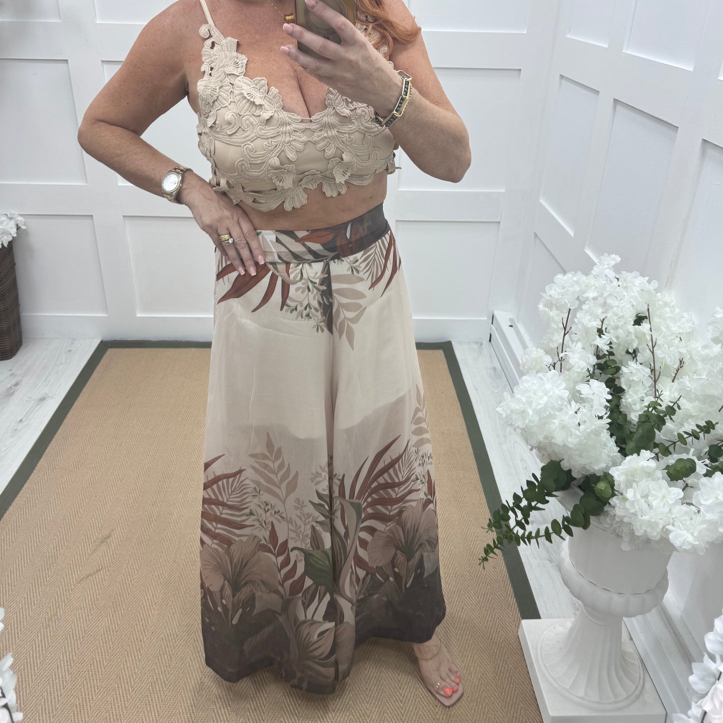 Lyra: Cream tropical print wide leg sheer trousers. One size: 8-14
