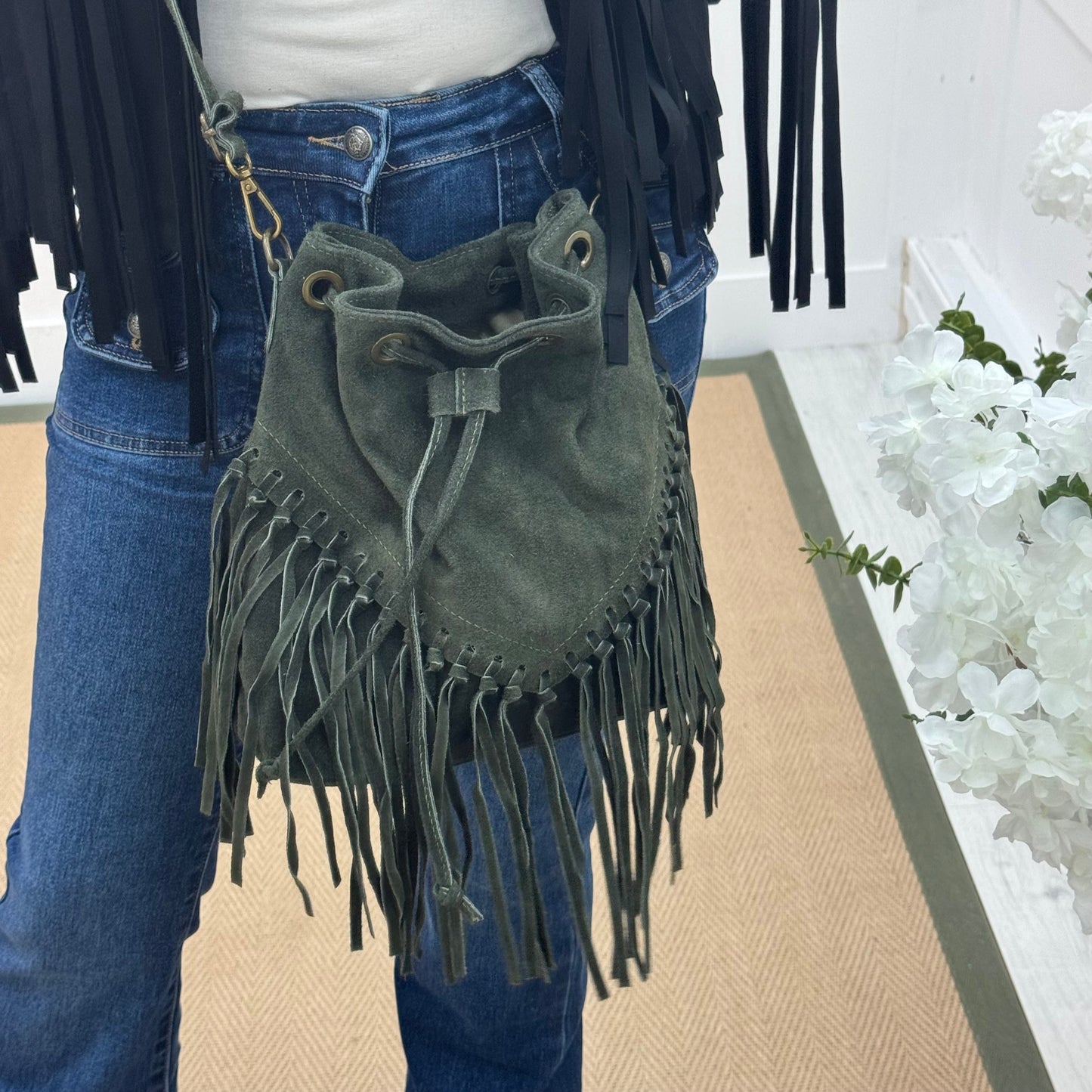 Athena: Green real suede fringe cross body bag.
