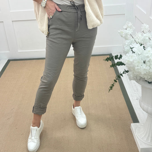 Marnie: Stretchy mocha magic trousers with rear pockets. 3 Sizes: 10-22