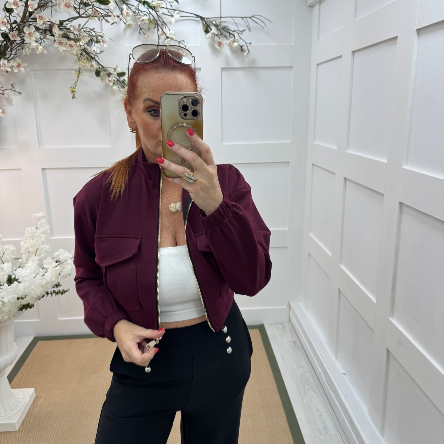 Bunty: Burgundy stretchy short bomber jacket. One size: 8-16