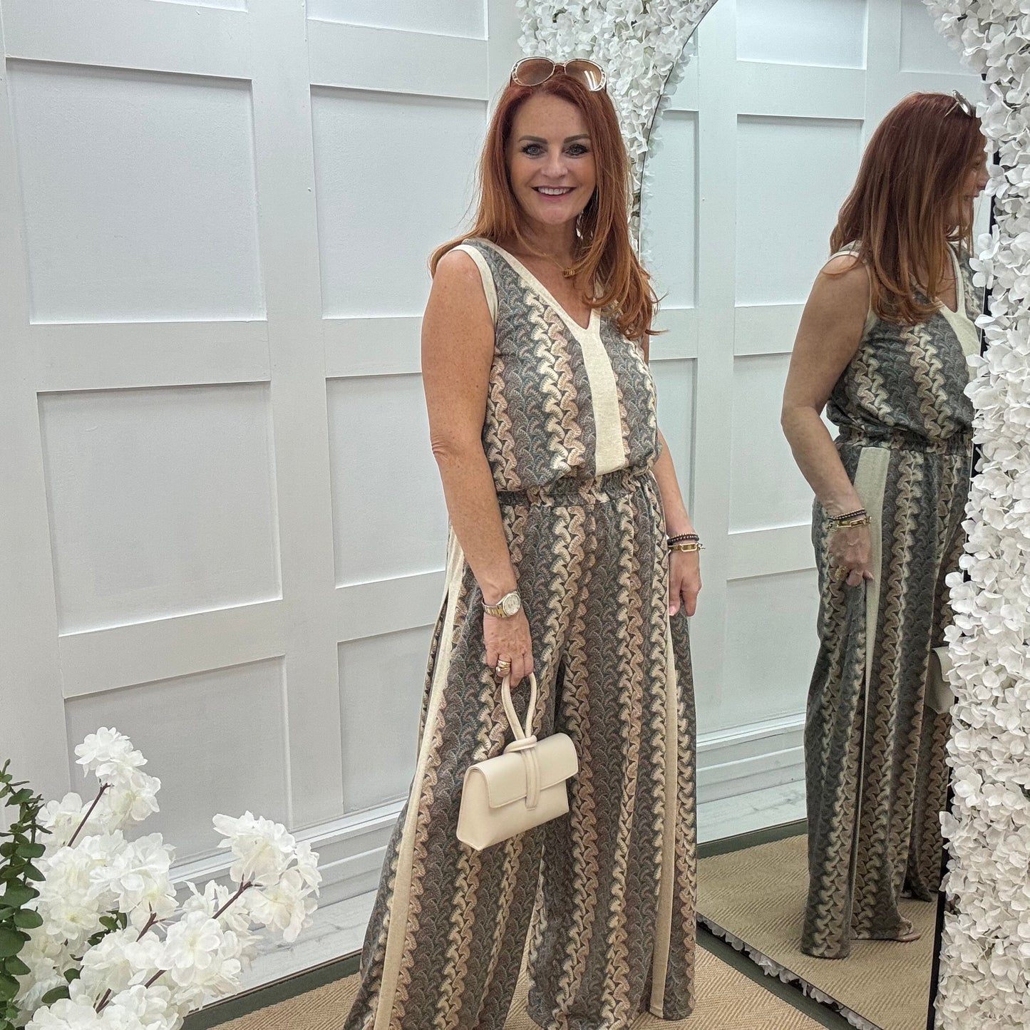 Pasha: Cream zigzag top & printed trouser co-ord set. One size: 12-18