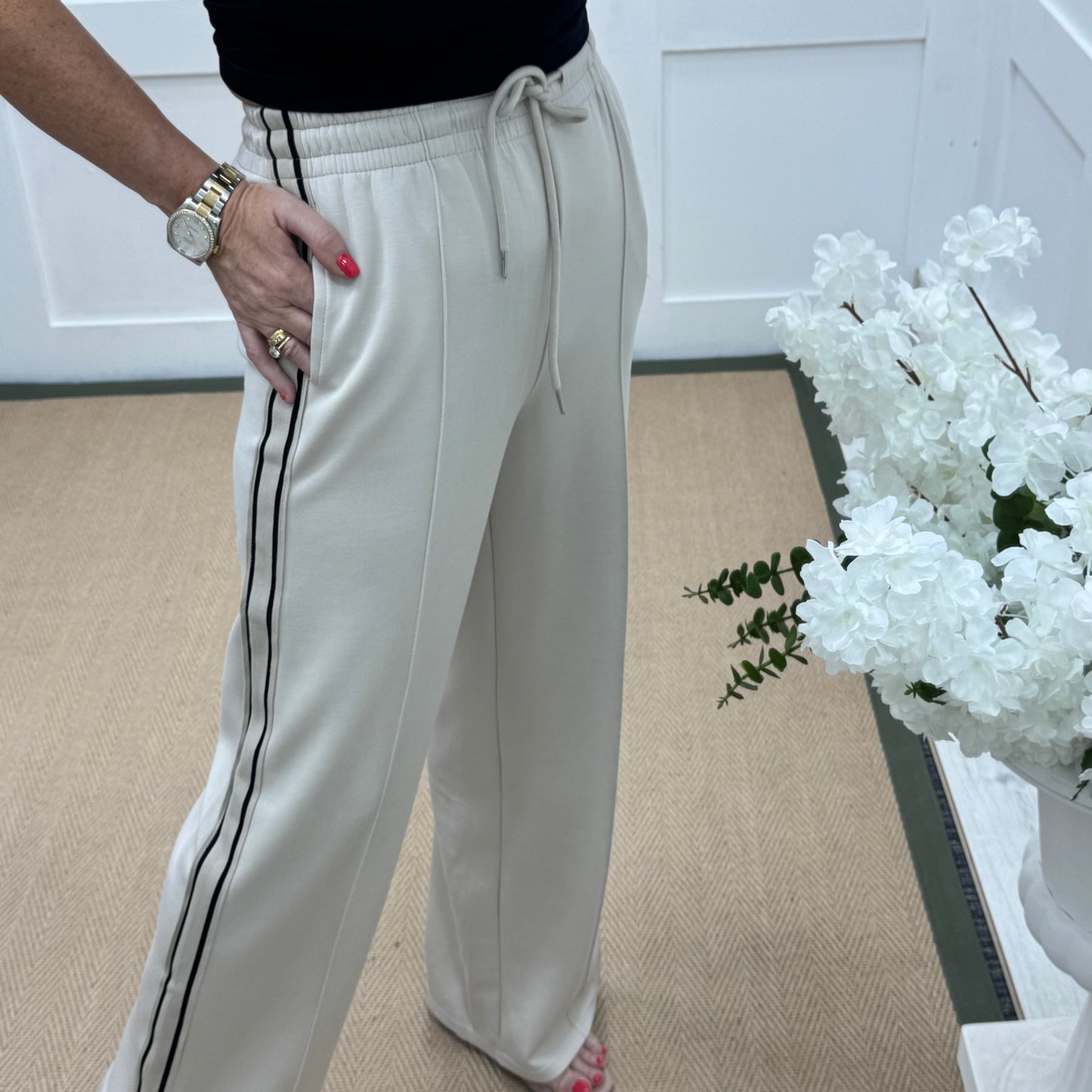 Roxi: Cream stretchy pocket sports trousers. 3 sizes