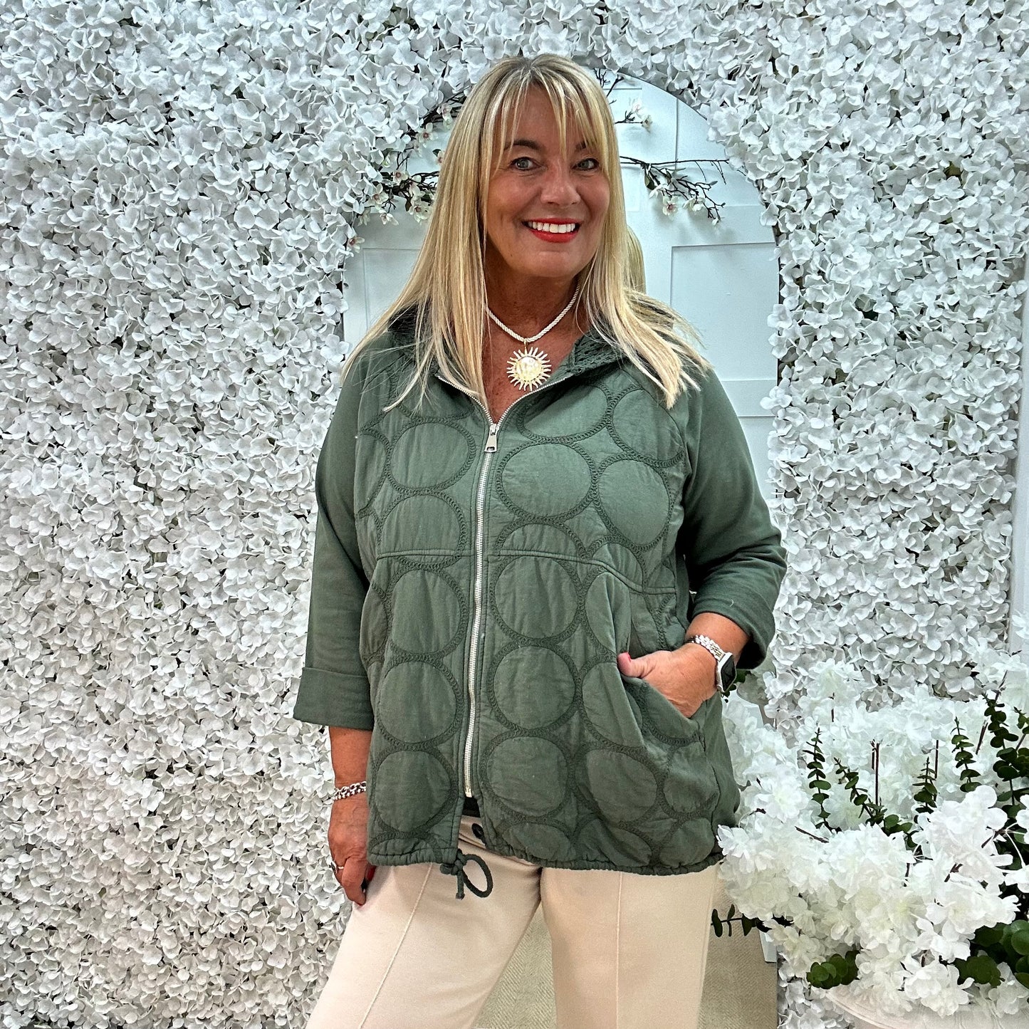 Malin: Khaki quilted hooded jacket. One size: 12-20
