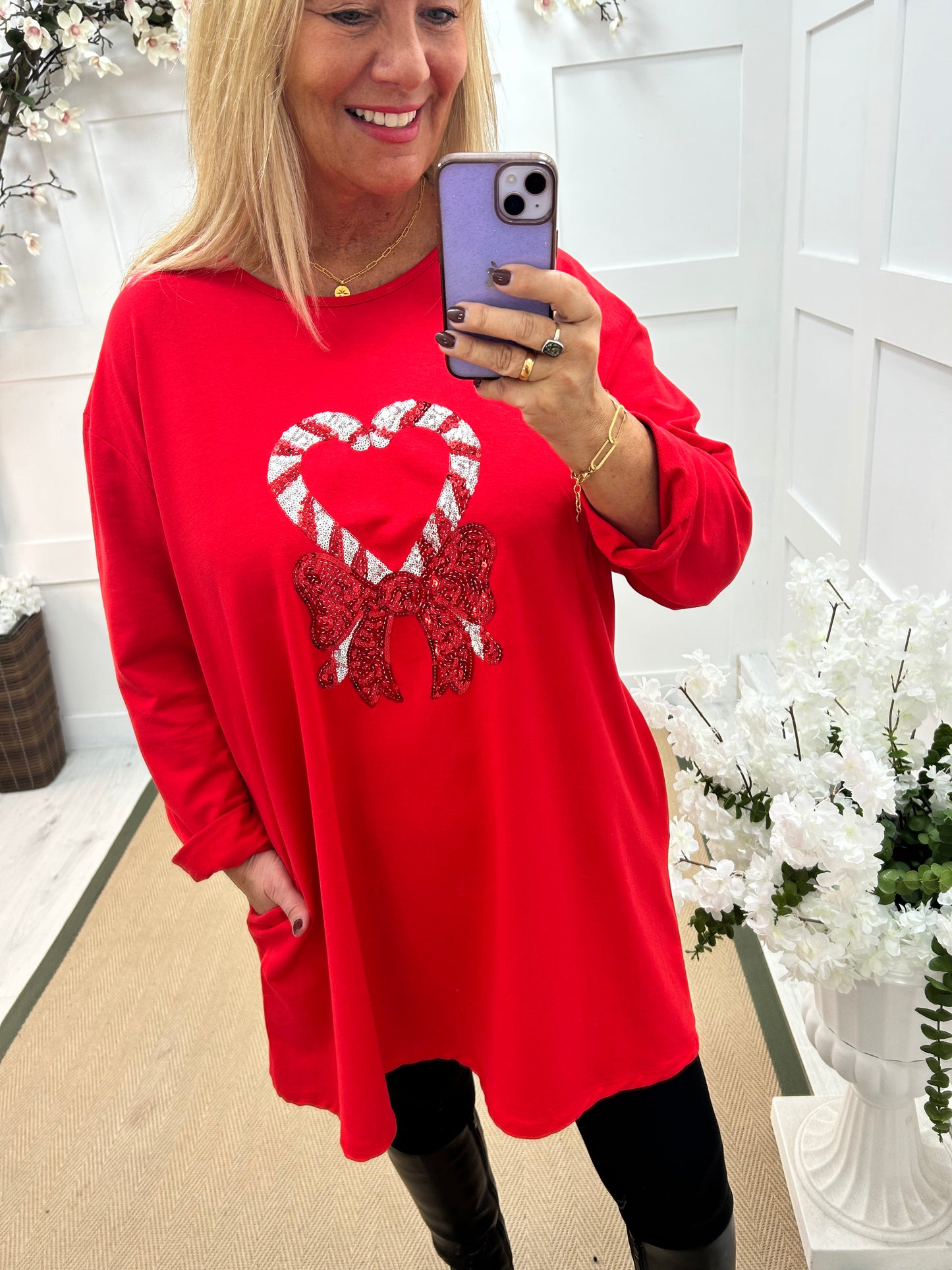 Candice: Red candy cane oversized top. One size: 16-20