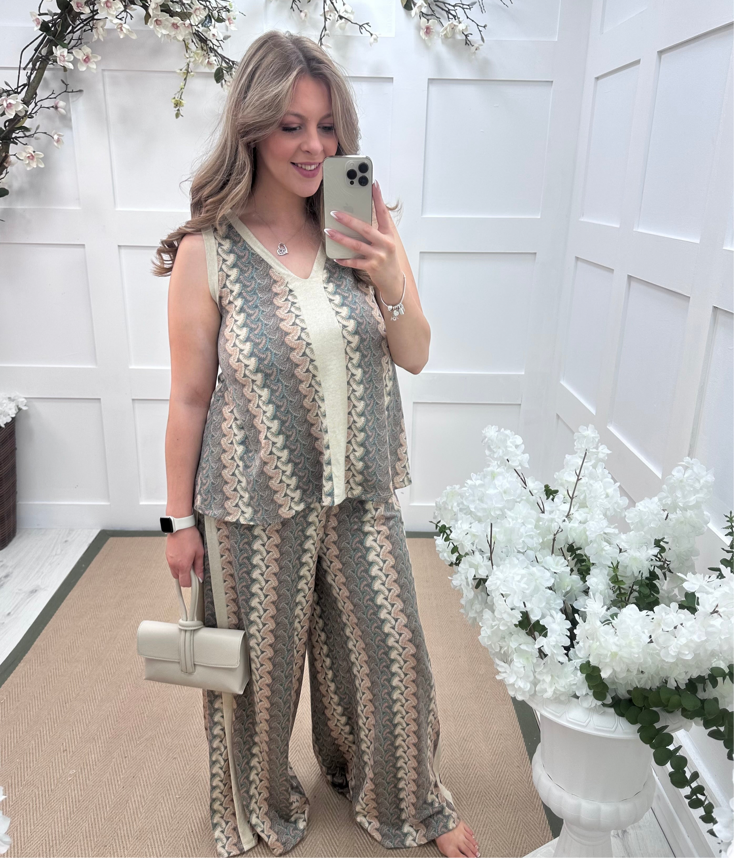Pasha: Cream zigzag top & printed trouser co-ord set. One size: 12-18