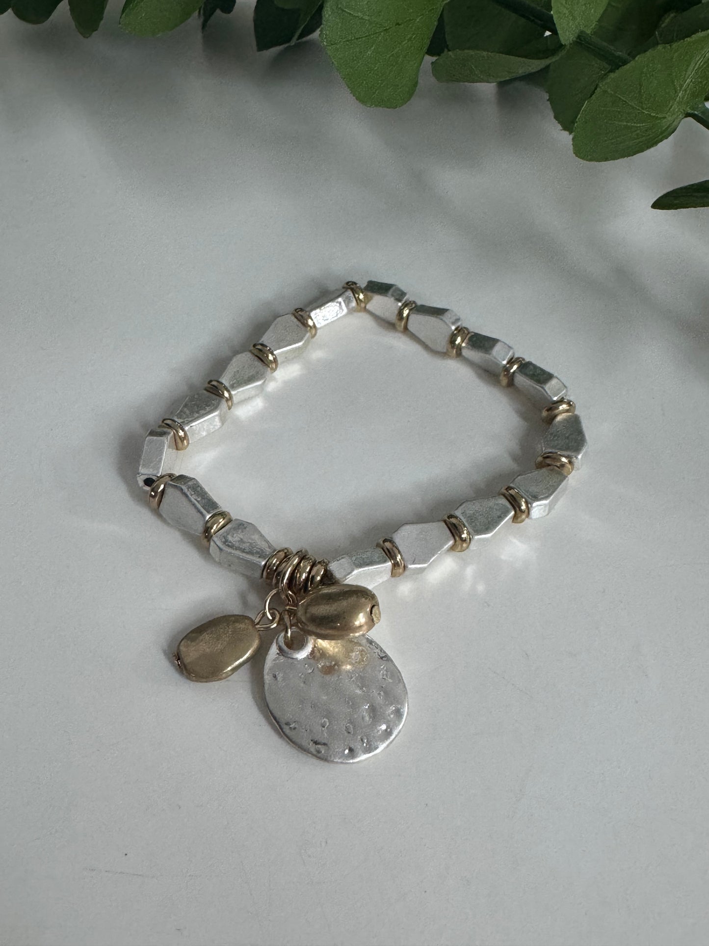 Shana: Silver & gold metal charm bracelet