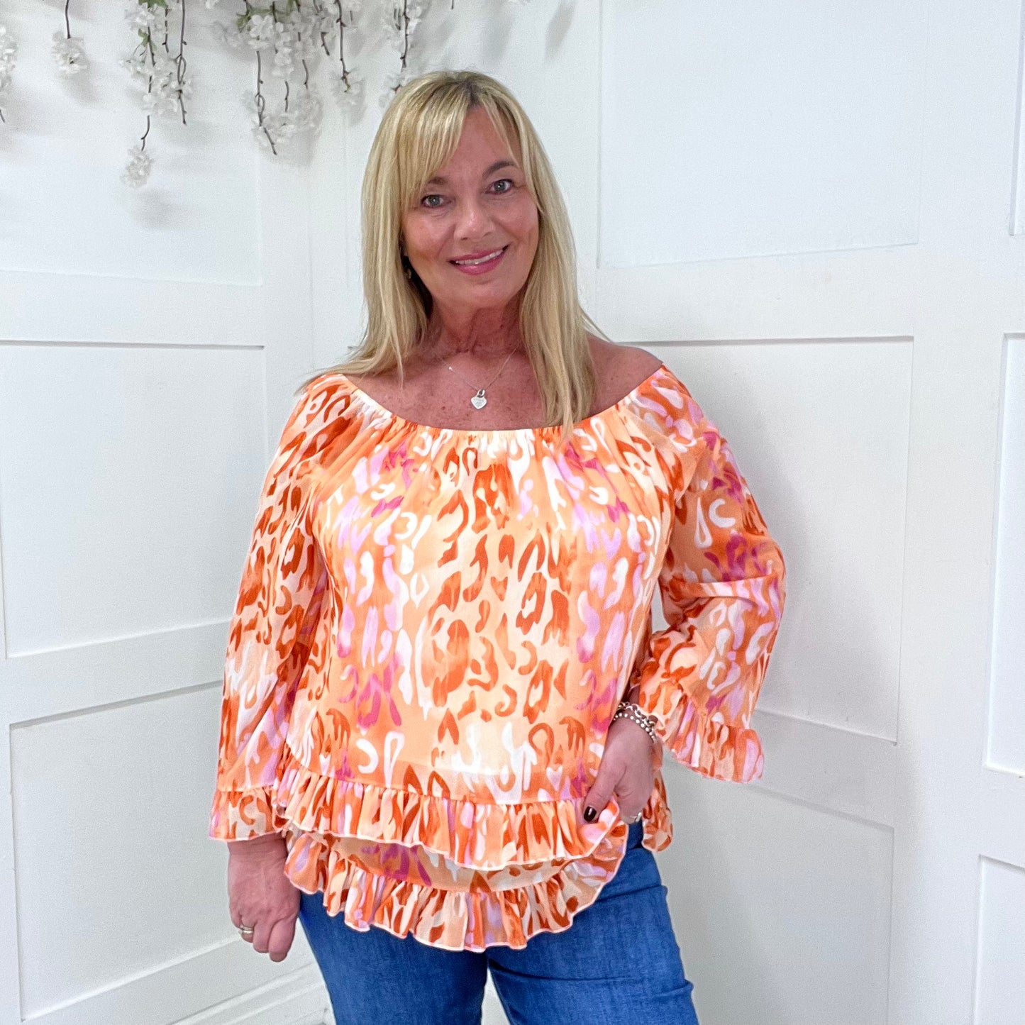 Foxy: Orange double frill chiffon top. One size: 10-20