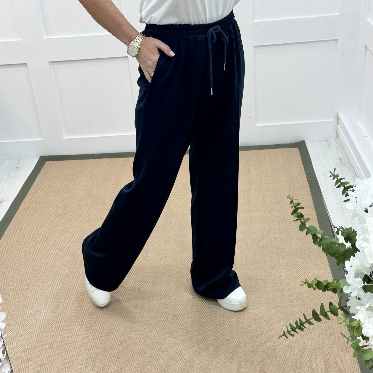 Trudy: Navy stretchy wide leg pocket trousers. 2 sizes