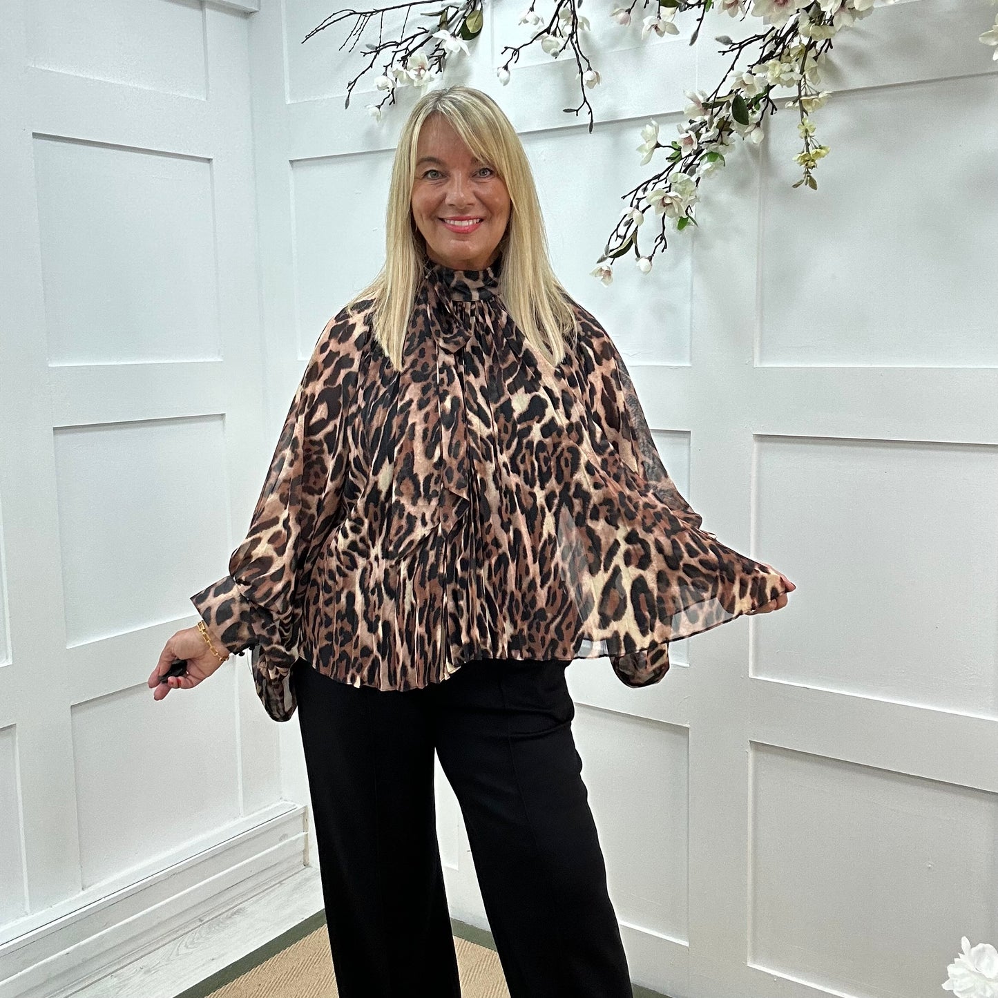 Leona: Oversized pleated leopard print blouse. One size: 14-20