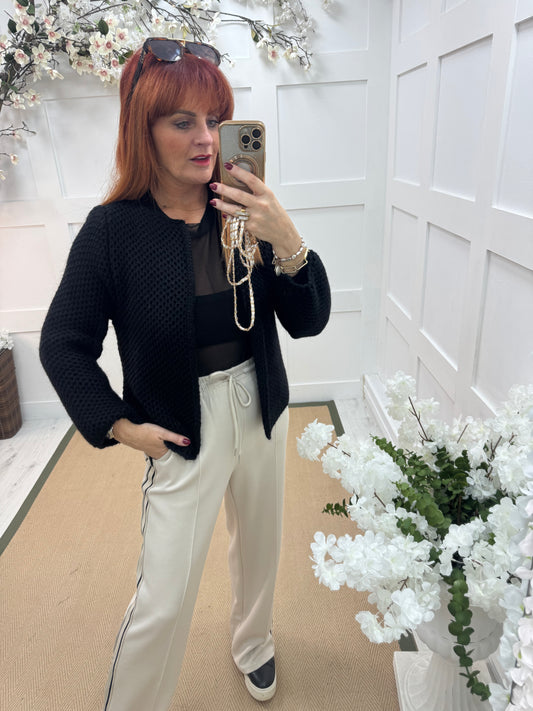 Skye: Black knitted boxcut cardigan. One size: 10-18