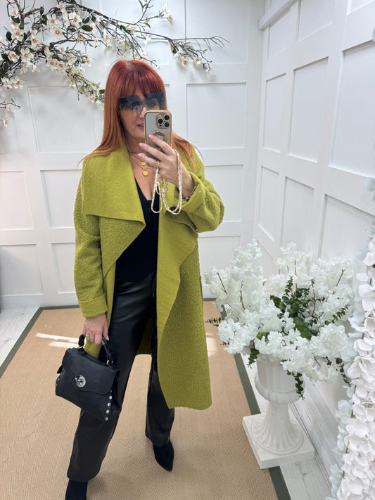 Kathie: Green boucle coat with pockets. One size 12-18